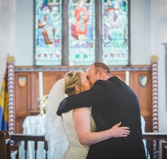 A couple posed after their wedding at St Mary's, Mablethorpe